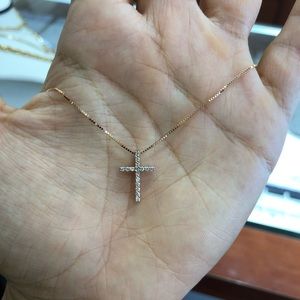 Rose gold diamond cross
